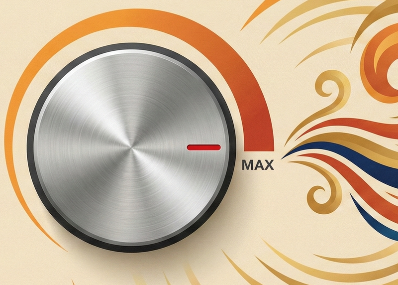 Decorative control knob with swirling design on a beige background